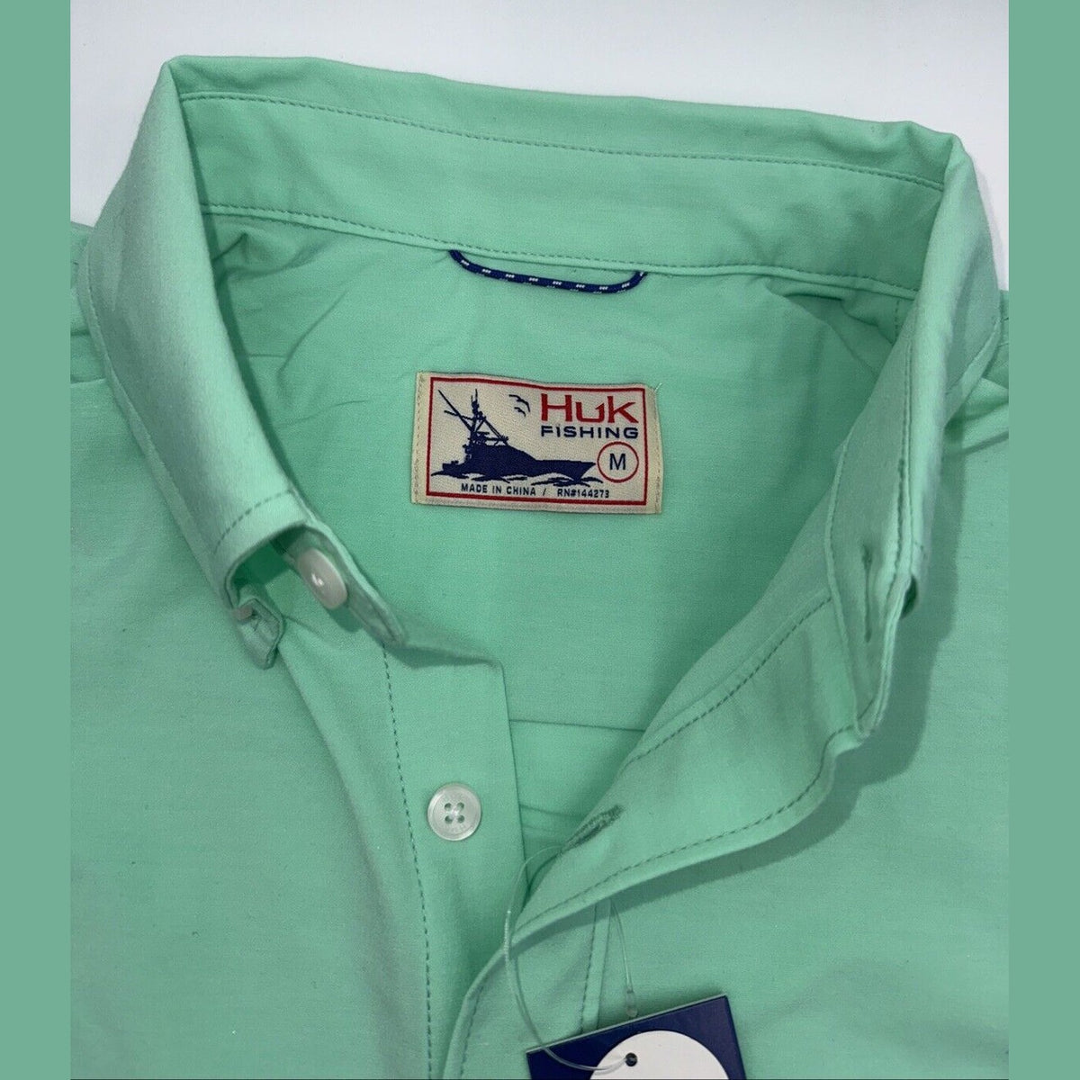 Huk Men’s Kona Solid Button up S/S Shirt- Color: Bermuda- Size: Medium- New