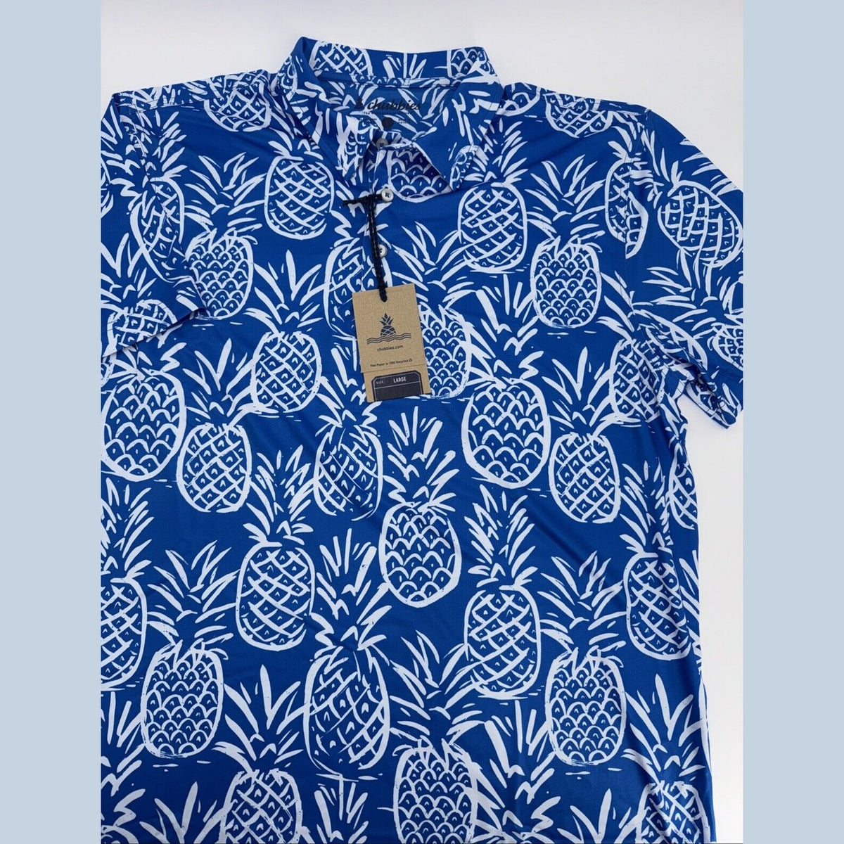 Chubbies Men's The Thigh Napple Performance Polo Shirt-Blue Pineapple-Large -New