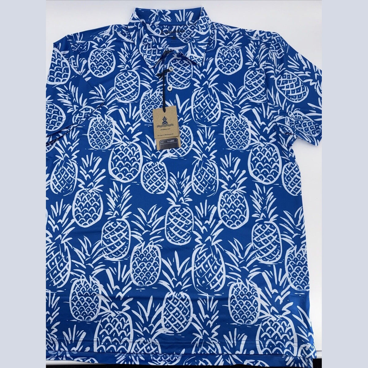Chubbies Men's The Thigh Napple Performance Polo Shirt- Blue Pineapple - XLarge