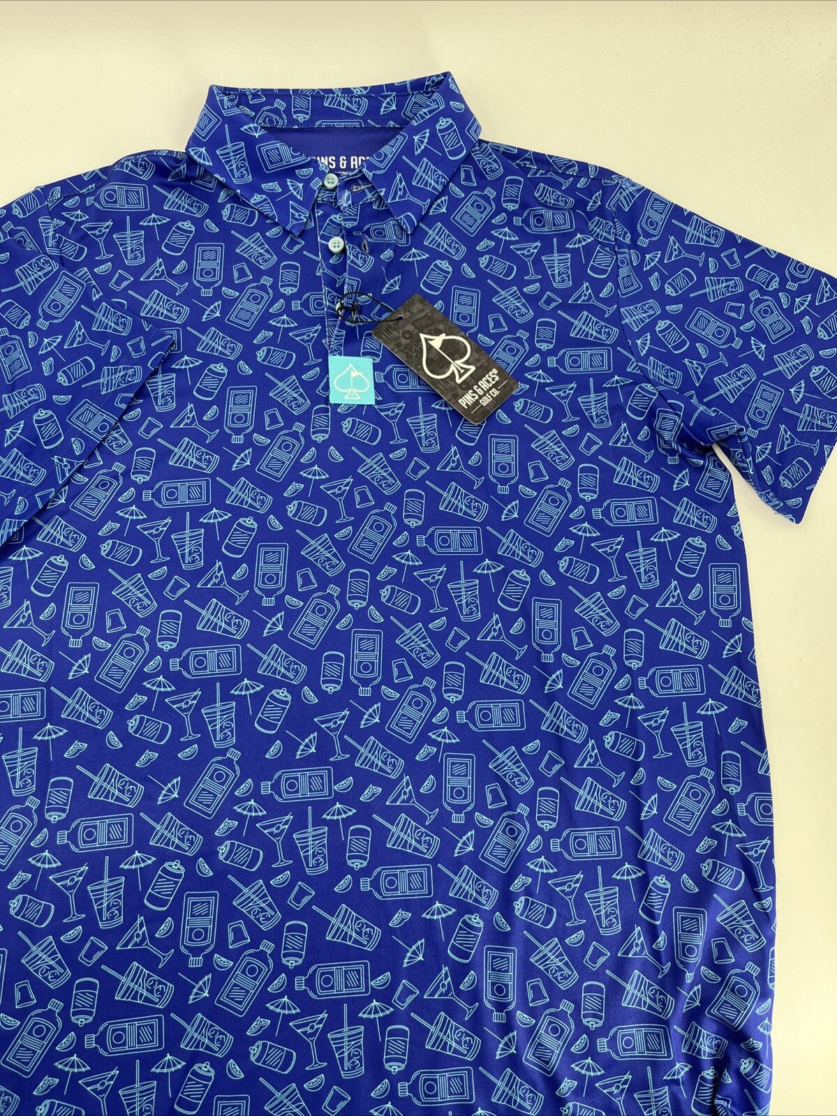$70 Pins & Aces Men’s Happy Hour Performance Stretch Polo-Blue Bonnet-Medium-New