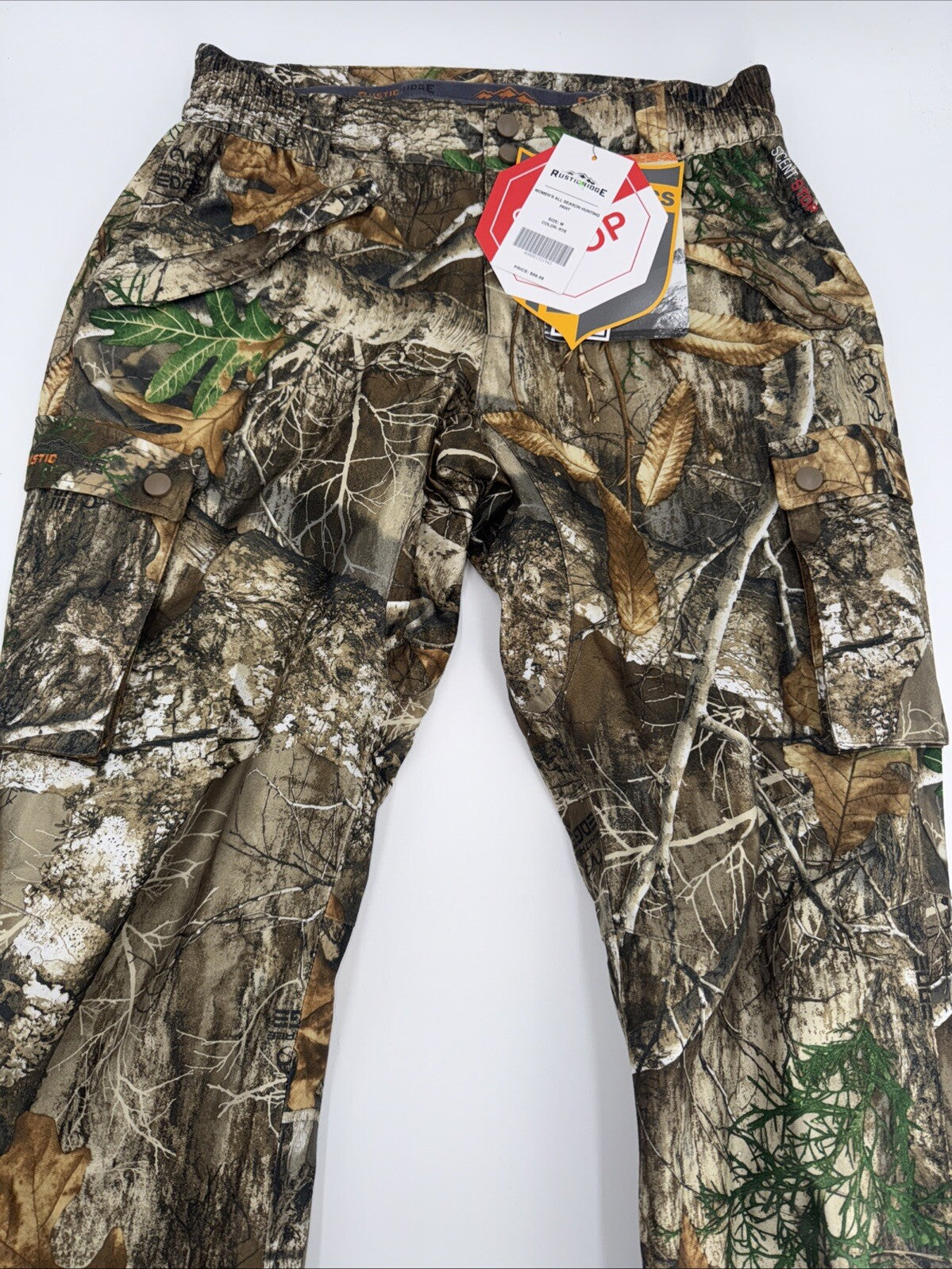 $100 Rustic Ridge Women’s All Season hunting pants Tree Camouflage- Medium