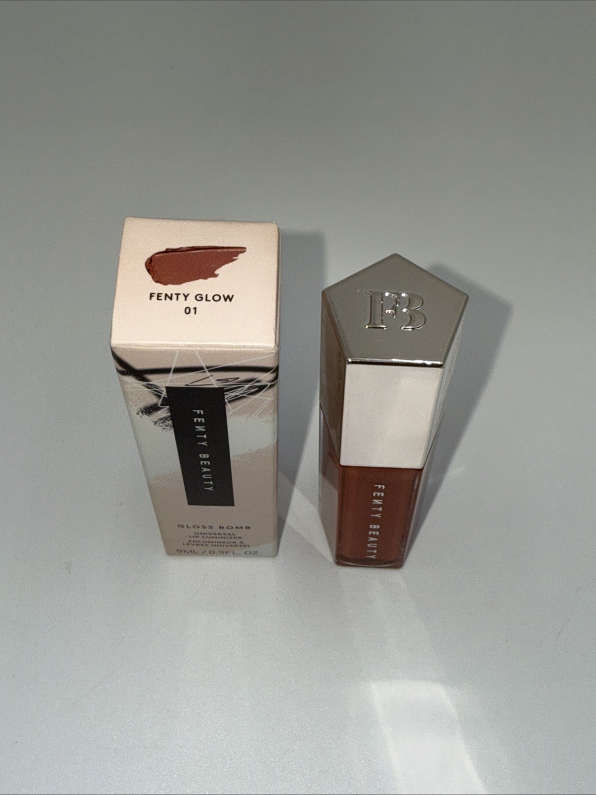 Fenty Beauty FENTY GLOW by Rihanna Gloss Bomb Oil - 9mL / 0.3 fl. oz.- New Fresh