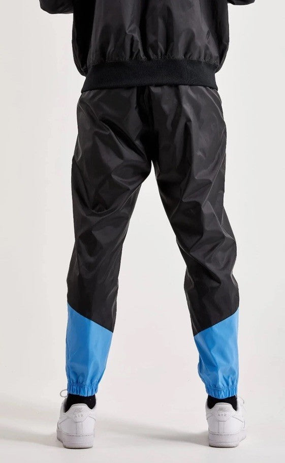 $95 Nike Men’s Windrunner Woven Lined Pants DX0653-010- Black/Blue- Small-New