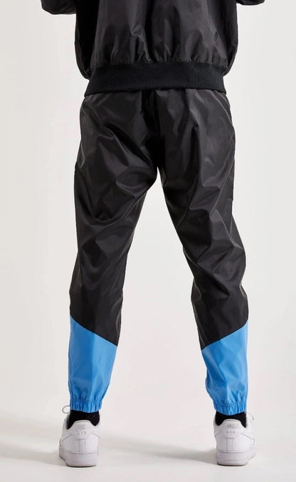 $95 Nike Men’s Windrunner Woven Lined Pants DX0653-010- Black/Blue- Small-New