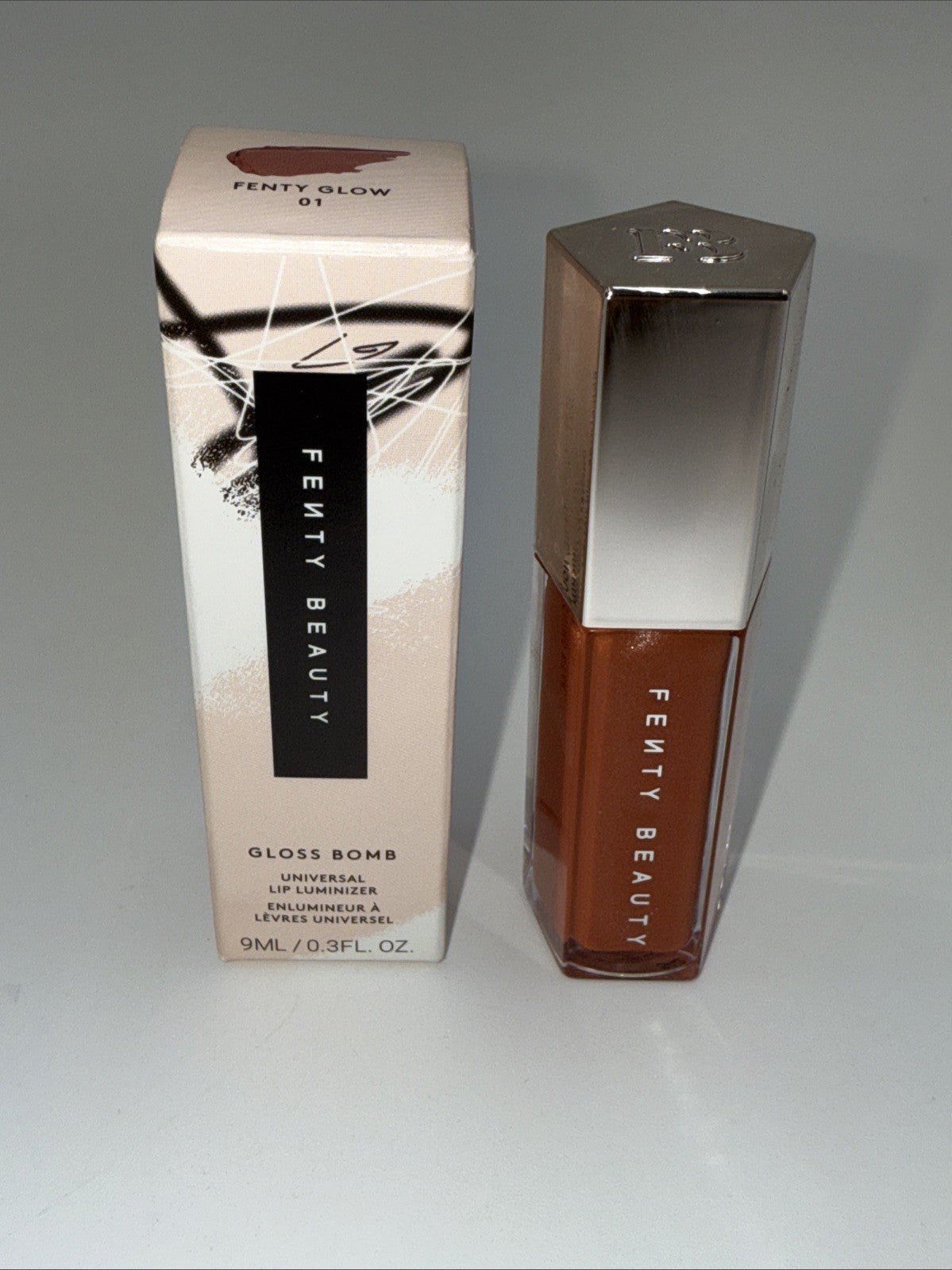 Fenty Beauty FENTY GLOW by Rihanna Gloss Bomb Oil - 9mL / 0.3 fl. oz.- New Fresh