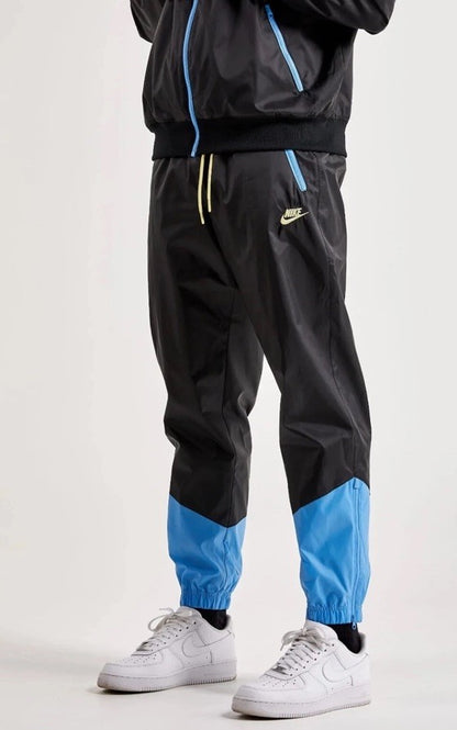 $95 Nike Men’s Windrunner Woven Lined Pants DX0653-010- Black/Blue- Small-New