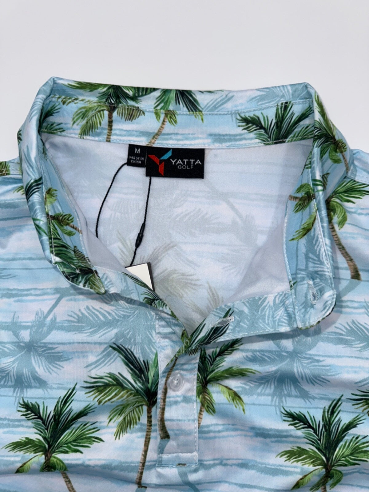 $40 Yatta Golf Men’s 3 Button Polo Shirt - Makani Olu Olu Print - Medium - New