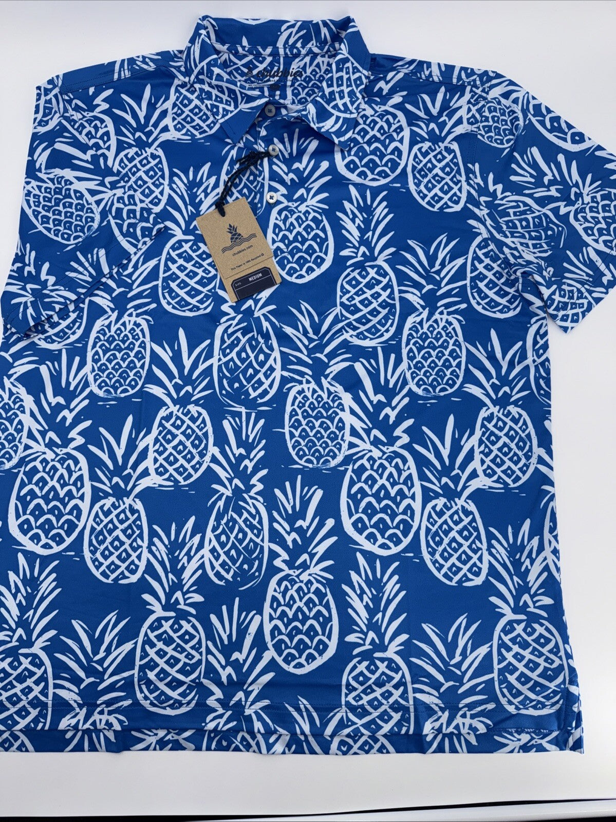Chubbies Men's The Thigh Napple Performance Polo Shirt-Blue Pineapple-Medium-New