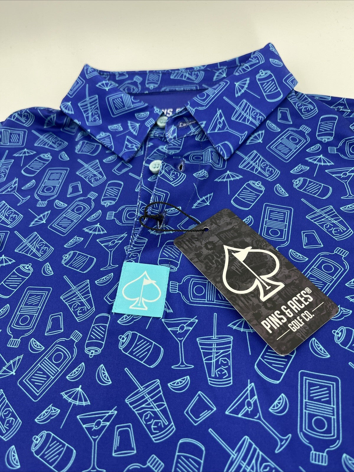 $70 Pins & Aces Men’s Happy Hour Performance Stretch Polo-Blue Bonnet-Medium-New