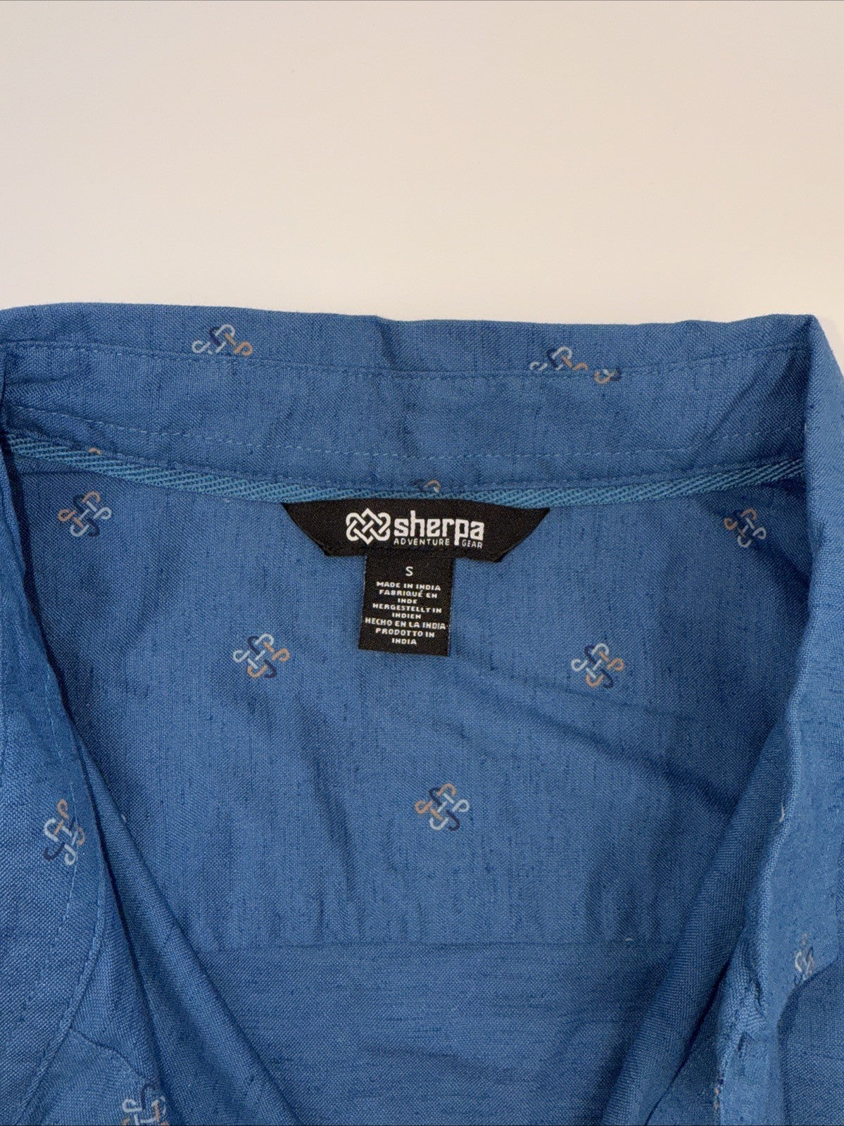 Sherpa Men’s  Tharu Short Sleeve Button Shirt- Lapis Endless Knot Blue- Small