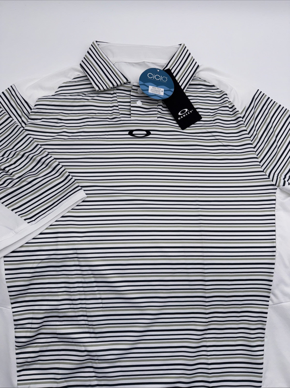 $70 Oakley Men’s C1 Archive Striped Polo Shirt - White Stripes- Size: Small- New
