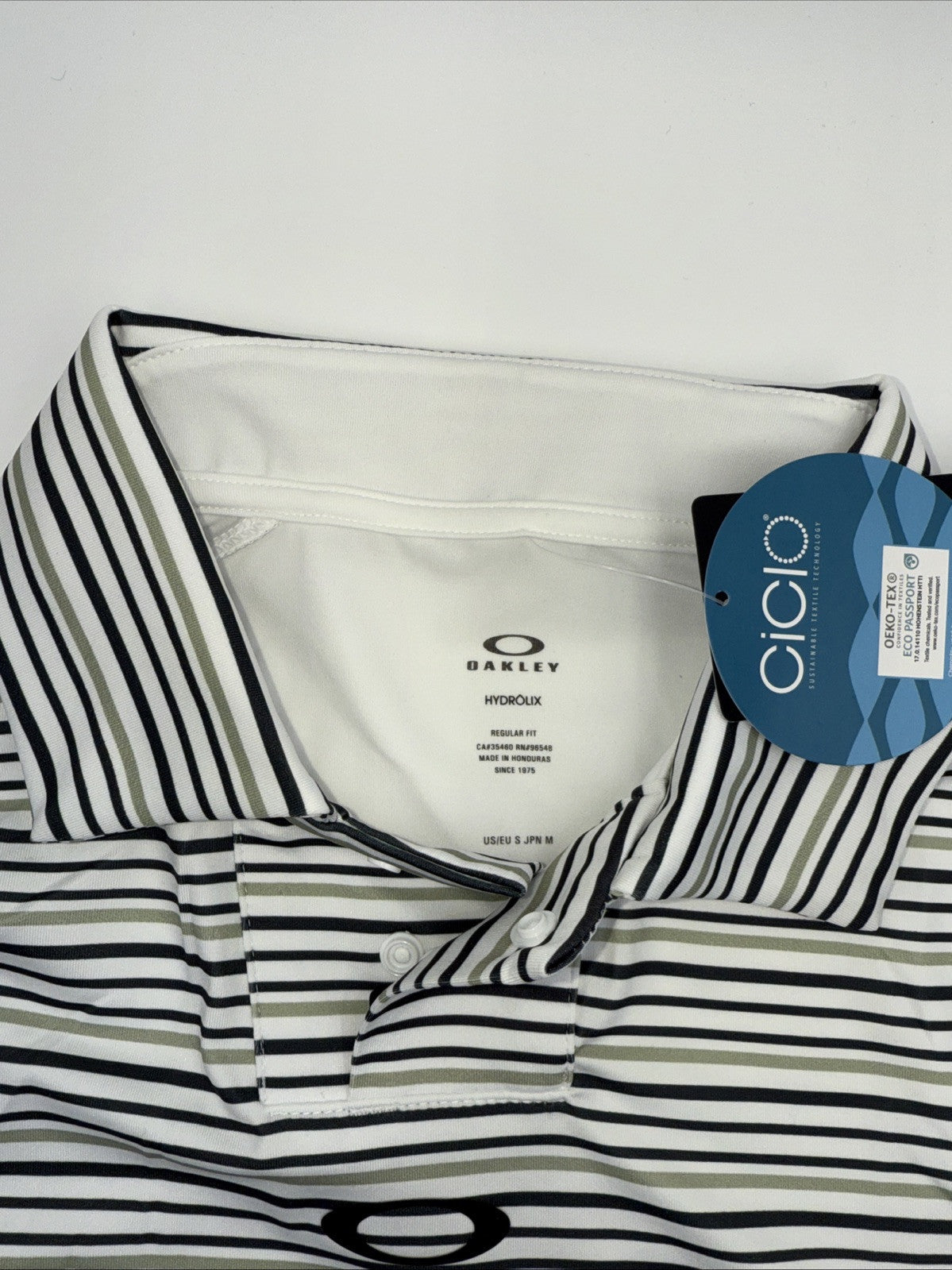 $70 Oakley Men’s C1 Archive Striped Polo Shirt - White Stripes- Size: Small- New